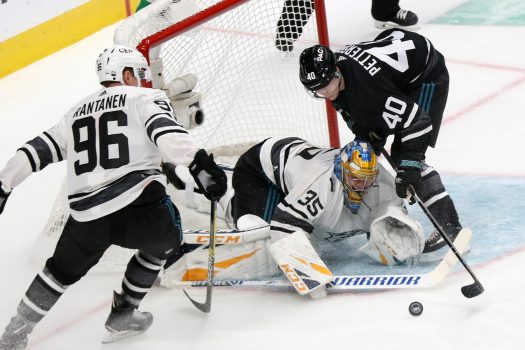 Central goalie Pekka Rinne makes a stop on a shot by Elias Pettersson (40)