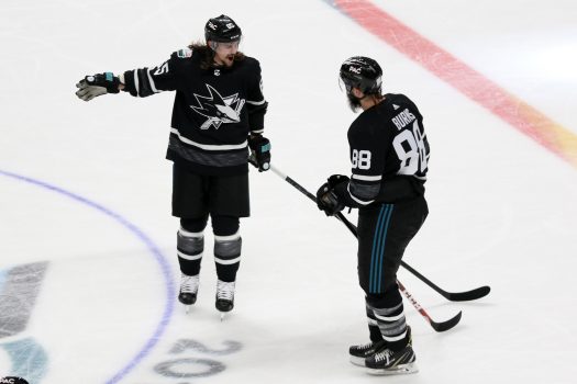 Erik Karlsson (Left) celebrates his second goal Brent Burns
