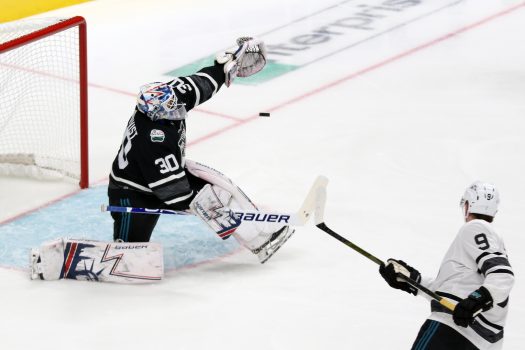 Metropolitan goalie Henrik Lundqvist stops a shot by Jack Eichel (9)