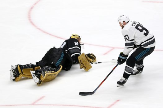 Pacific goalie Marc-Andre Fleury comes out of his net to challenge Ryan O'Reilly