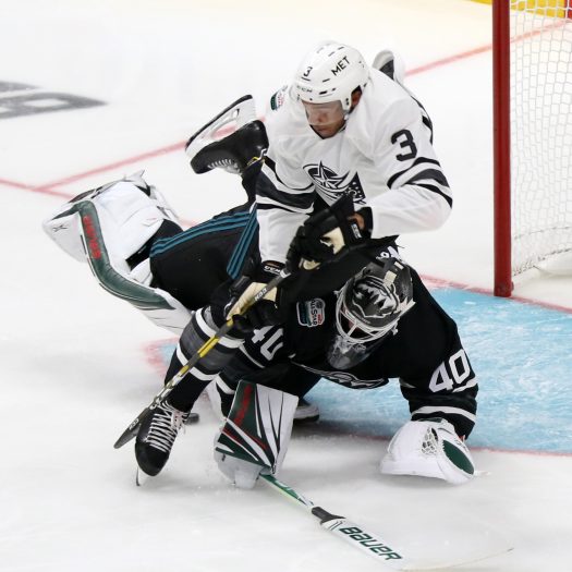 Seth Jones collides with goalie Devan Dubnyk