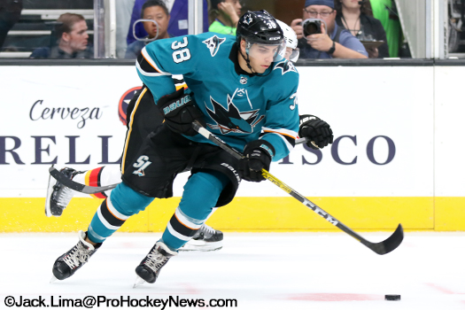 Sharks defenceman Mario Ferraro (38) skates the puck up ice