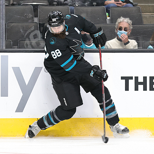 Brent Burns (88) makes a pass