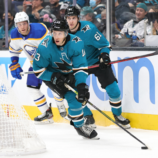 Nick Bonino (13) looks to make a pass