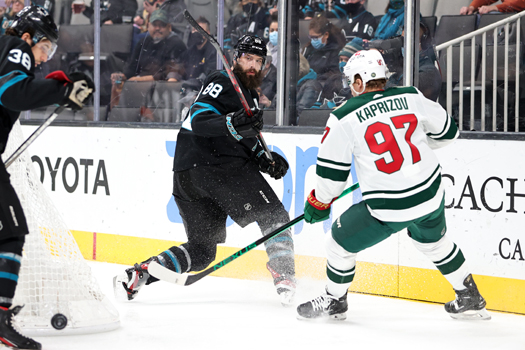 Brent Burns (88) clears the puck from behind the Sharks net - Photo by Jack Lima