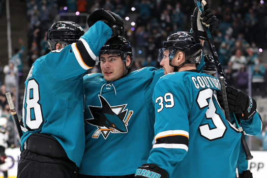 Timo Meier (Center) celebrates his second period goal with Brent Burns (Left) and Logan Couture (39)