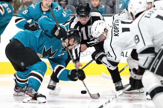 Logan Couture (Left) and Anze Kopitar faceoff