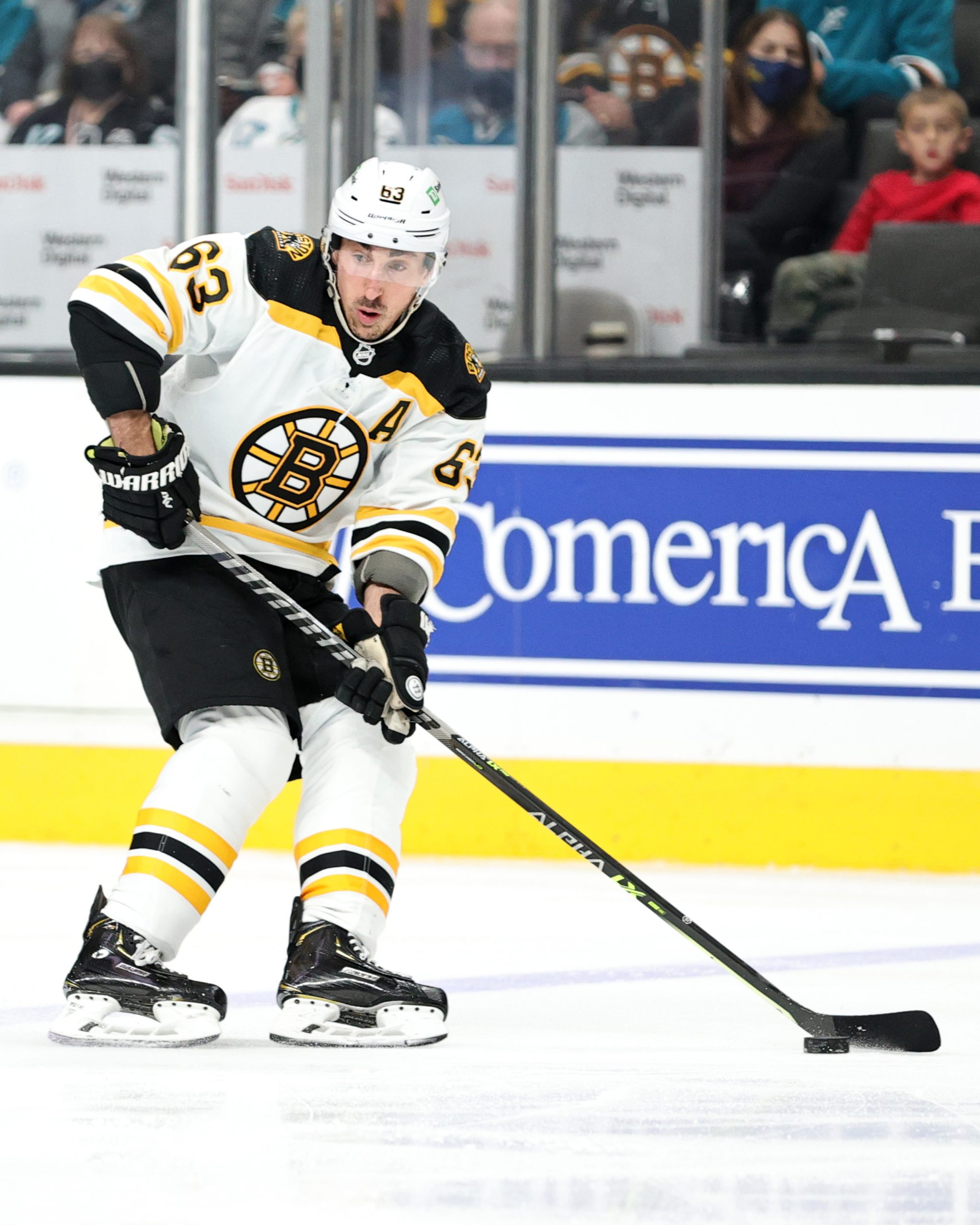 Brad Marchand looks to make a pass