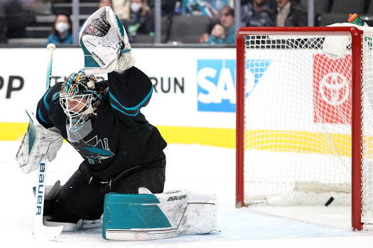 Sharks goalie James Reimer misses a shot off the stick of Juho Lammikkos, not pictured, to tie the score during second period action.