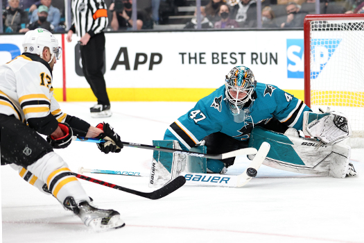 Sharks' goalie James Reimer makes a save on a shot by Nick Foligno (17)