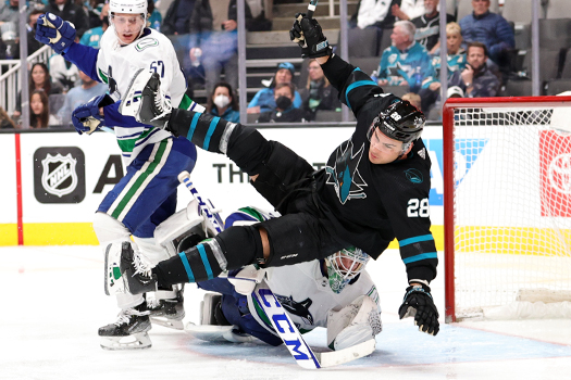 Timo Meier (28) draws an interference penalty for colliding with Canucks goalie Thatcher Demko