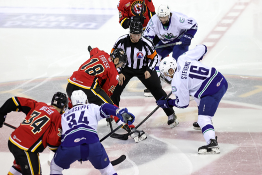 Game opening face-off with Byron Froese (18) and John Stevens (16)