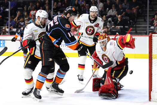 Heat goalie Adam Werner stops a shot attempt by Bryce Kindopp (16) - Photo by Jack Lima