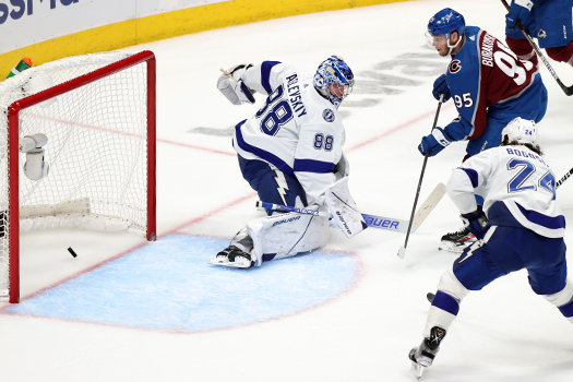 Andre Burakovsky (95) watches his shot elude goaltender Andrei Vasilevskiy (88) for a first period goal
