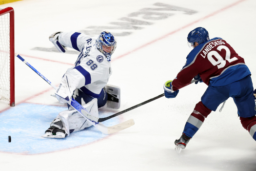 Lightning goalie Andrei Vasilevskiy (88) stops a shot by Gabriel Landeskog (92)