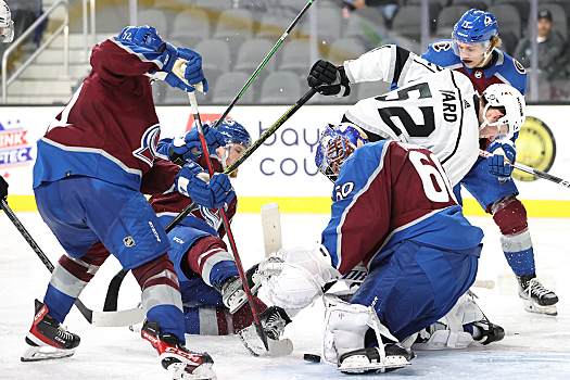 Avalanche goalie Justus Annunen makes a save in traffic late in the third period