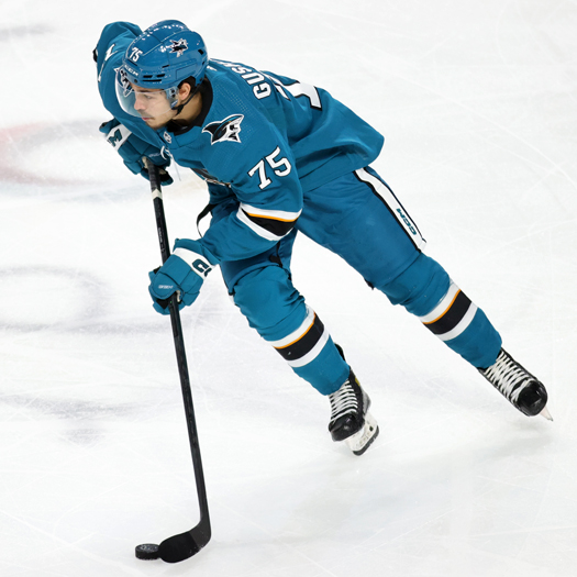 Danil Gushchin moves the puck up ice