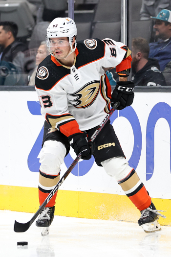 Ducks' defenseman Axel Andersson looks to make a pass