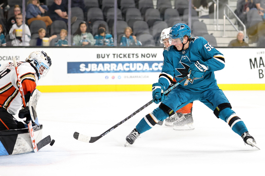 Ethan Cardwell (56) takes a shot on Ducks goalie Gage Alexander