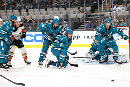 (L-R) Luke Kunin (11) Nathan Gaucher (46) Matt Nieto (83) Ryan Merkley (6) and Marc-Edouard Vlasic (44) follow the rebound