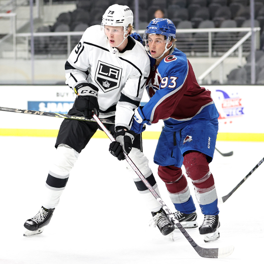 Samuel Helenius (79) and Jean-Luc Foudy (93) fight for position in front of the net