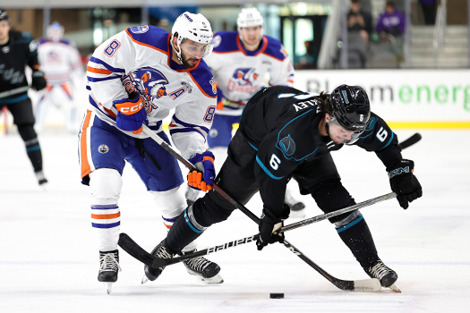 Barracuda's defenseman Ryan Merkley (6) breaks up a pass intended for Yanni Kaldis (8)