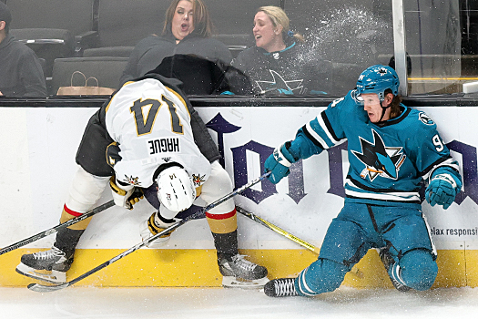 Nicolas Hague (14) and Alexander Barabanov (94) collide along the boards