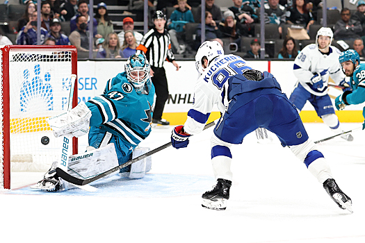 Nikita Kucherov (86) scores the game winning goal past Sharks goalie James Reimer in the final minute of play