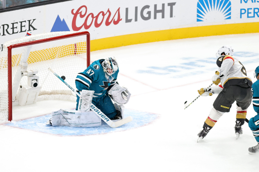 Phil Kessel (8) scores his 400th career goal past Sharks goalie James Reimer