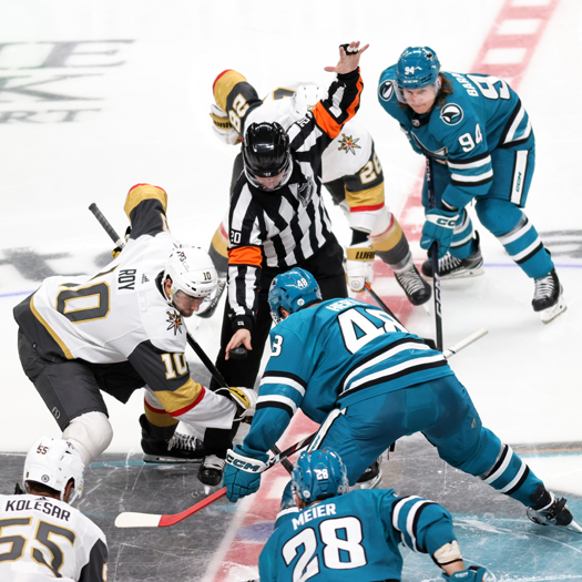 Referee Mitch Dunning drop the puck between Nicolas Hague (10) and Tomas Hertl (48) to open the 2nd period
