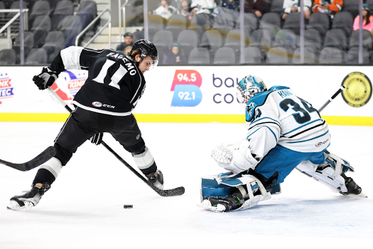 Samuel Fagemo (11) attempts a between the legs shot on goalie Strauss Mann