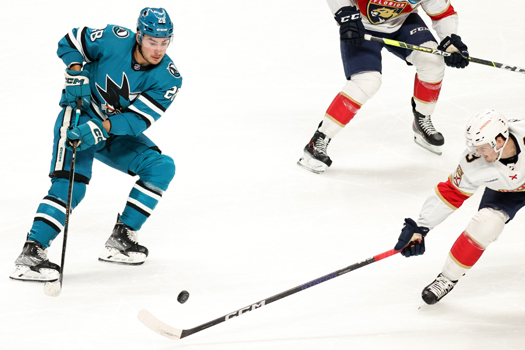 Timo Meier (28) attempts a pass as Panthers defenseman Matt Kiersted (Right) attempts to break up the play
