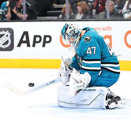 Sharks' goalie James Reimer makes a stick save during first period action