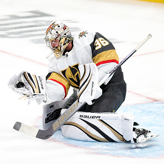 Golden Knights goalie Logan Thompson makes a glove save