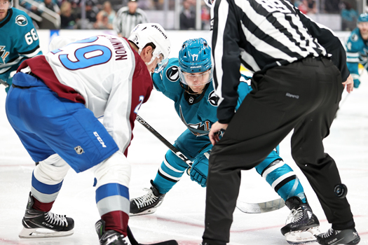 Nathan MacKinnon (29) faces off against Thomas Bordeleau (17) during third period action