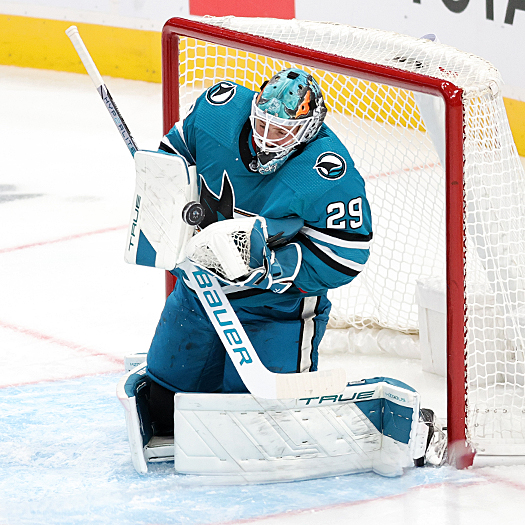 Sharks goalie Mackenzie Blackwood stops a shot during first period action