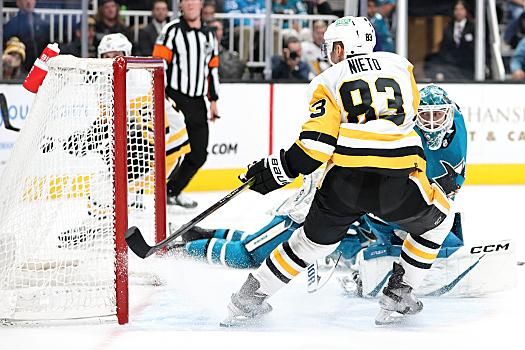Matt Nieto (83) scores a second period goal past Sharks goalie Magnus Chrona
