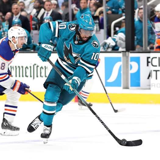 Sharks forward Anthony Duclair (10) skates into the Sharks offensive zone during third period action