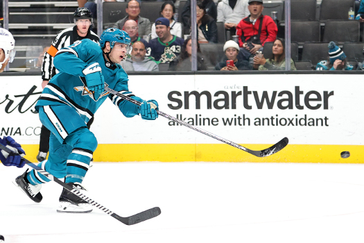 Sharks forward Jacob MacDonald takes a shot on goal