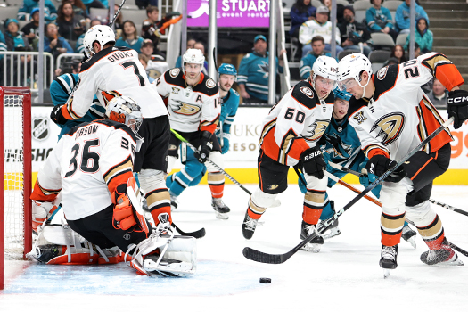 Ducks forward Brett Leason (20) controls a rebound in front of goalie John Gibson