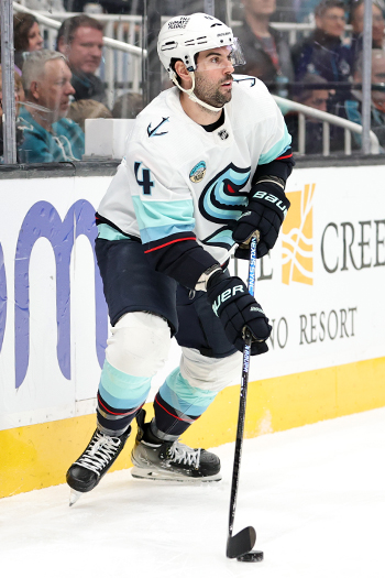Kraken defenseman Justin Schultz looks to make a pass during a Kraken first period power play