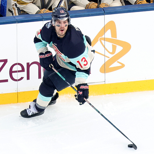 Kraken forward Brandon Tanev looks to make a pass