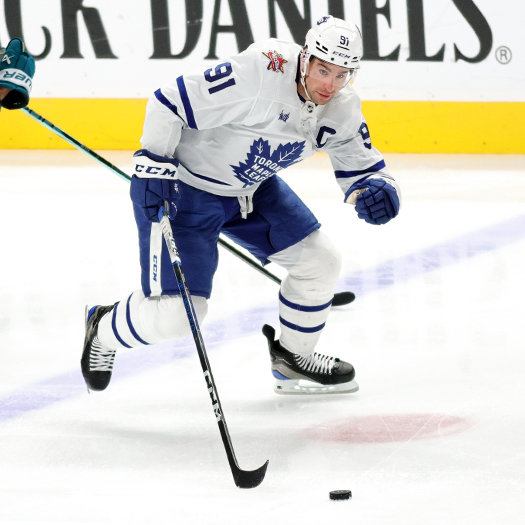 Maple Leafs captain John Travares moves the puck up ice