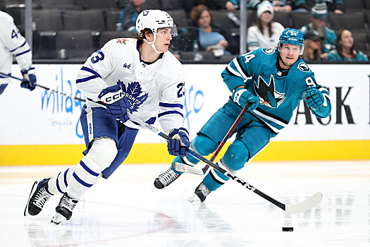 Maple Leafs forward Matthew Knies moves the puck up ice during third period action