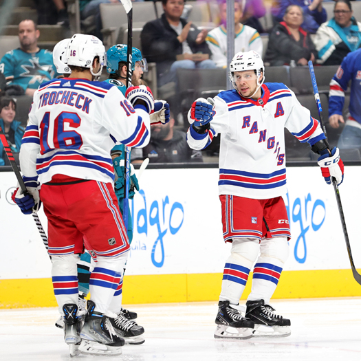 Rangers forward Artemi Panarin (right) celebrates his second period goal with teammate Vincent Trocheck (16)