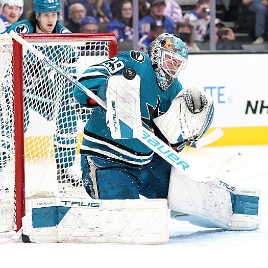 Sharks goalie Mackenzie Blackwood makes a blocker save during second period action