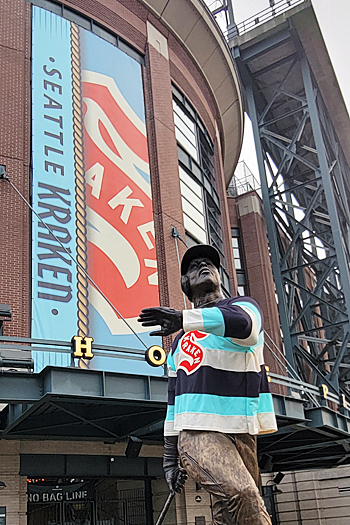The Ken Griffey Jr statue welcomes hockey fans to the 2024 Winter Classic at T-Mobile Park