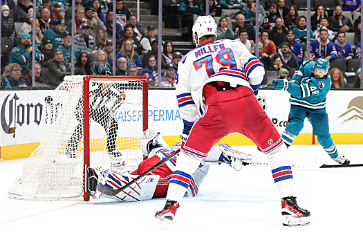 Tomas Hertl (48) scores the game winning overtime goal as his shot hits the back of the net past goalie Igor Shesterkin