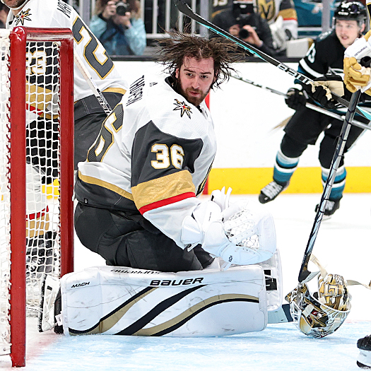 Golden Knights goalie Logan Thompson looses his mask during third period action