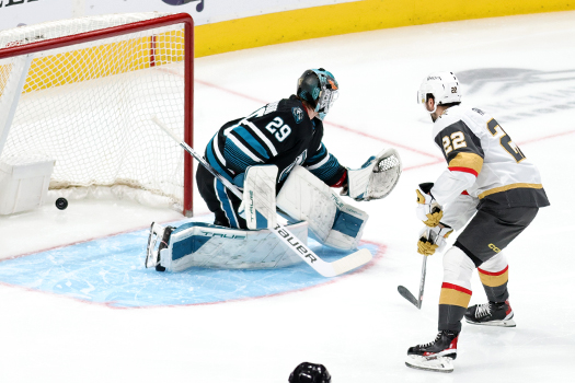 Michael Amadio (22) opens the scoring with a shot past Sharks goalie Mackenzie Blackwood